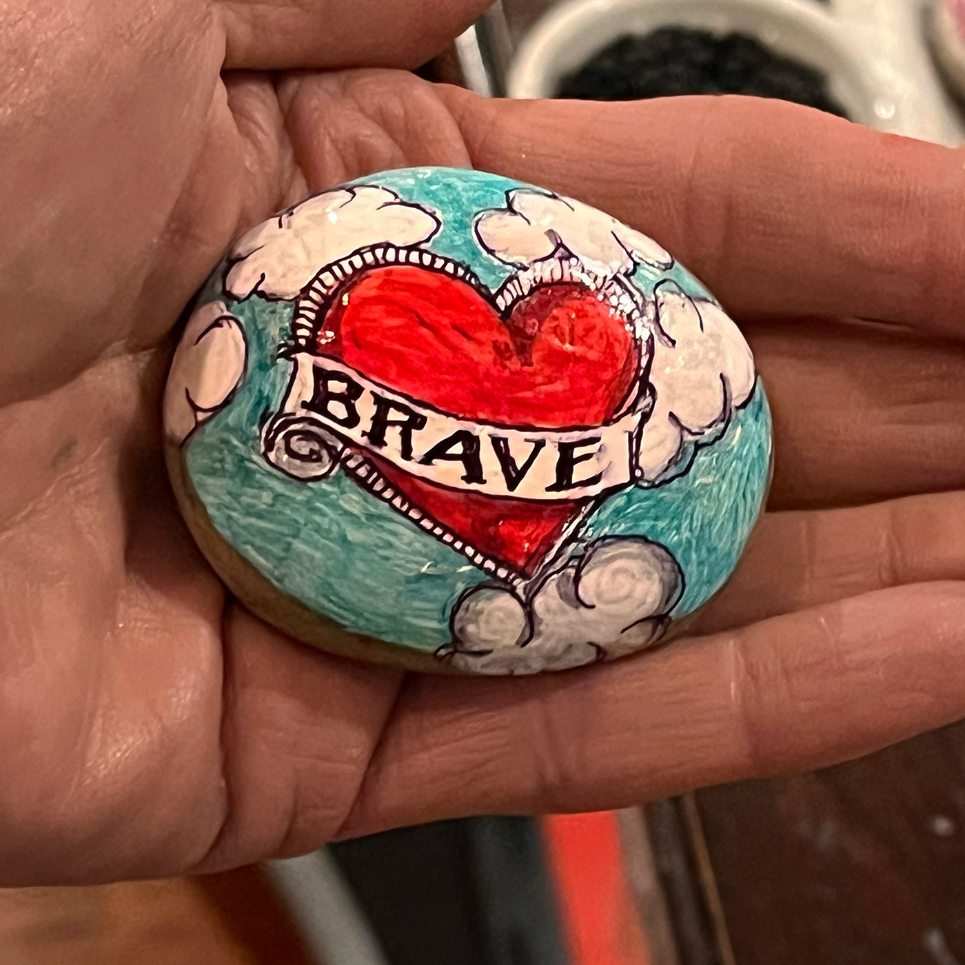 Hand painted stone - - "Brave heart"